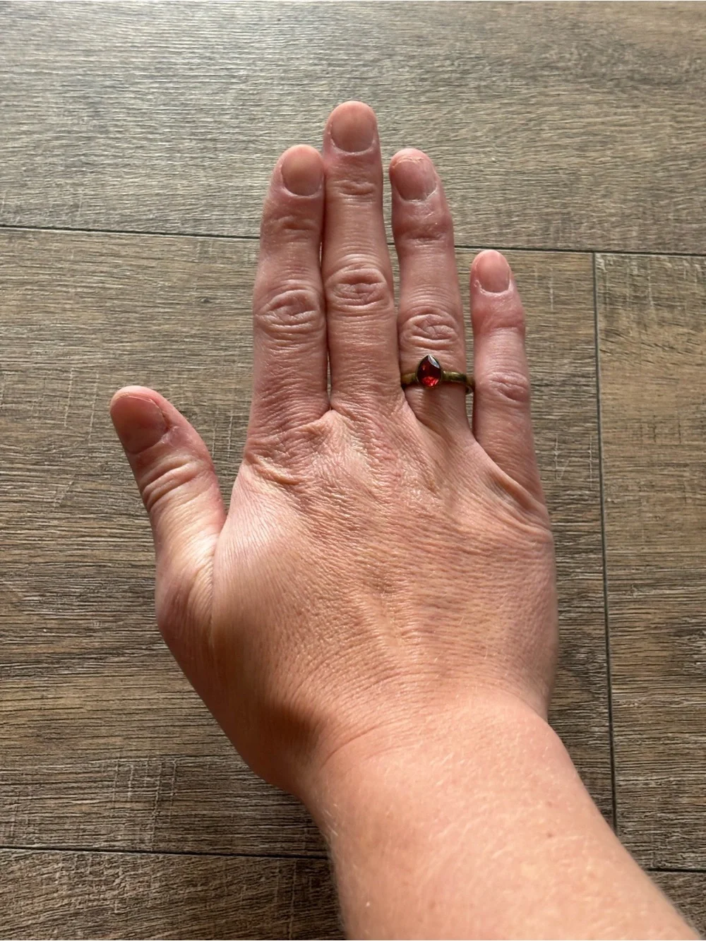 Fashion Jewelry Women’s size 10.5 brass tone pear shape red stone bezel ring